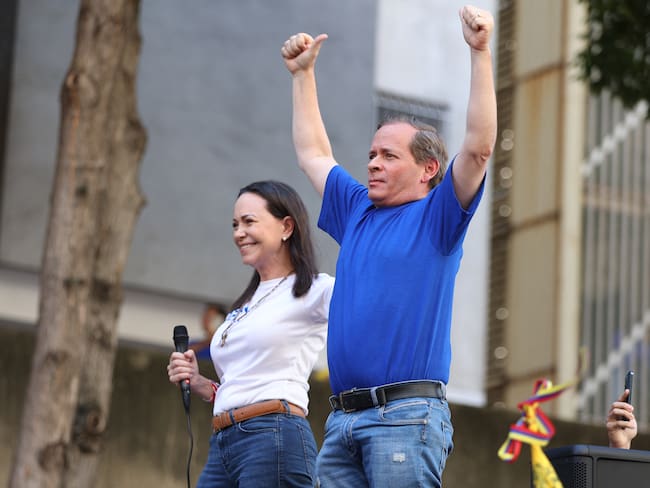 Juan Pablo Guanipa y Maria Corina Machado. Foto: PEDRO MATTEY/AFP via Getty Images.