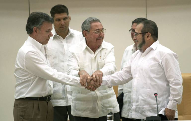 Presidente Juan Manuel Santos y máximo líder de las Farc, Timoleón Jiménez alias Timochenko.