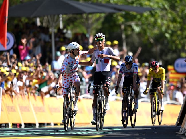BARCELONA, SPAIN - JULY 05: (L-R) Tadej Pogacar of Slovenia - Polka dot Mountain Jersey and stage winner Isaac Del Toro of Mexico and UAE Team Emirates - XRG celebrate at finish line during the 113th Tour de France 2026, Stage 2 a 168.5km stage from Tarragona to Barcelona 109m / #UCIWT / on July 05, 2026 in Barcelona, Spain. (Photo by Tim de Waele/Getty Images)