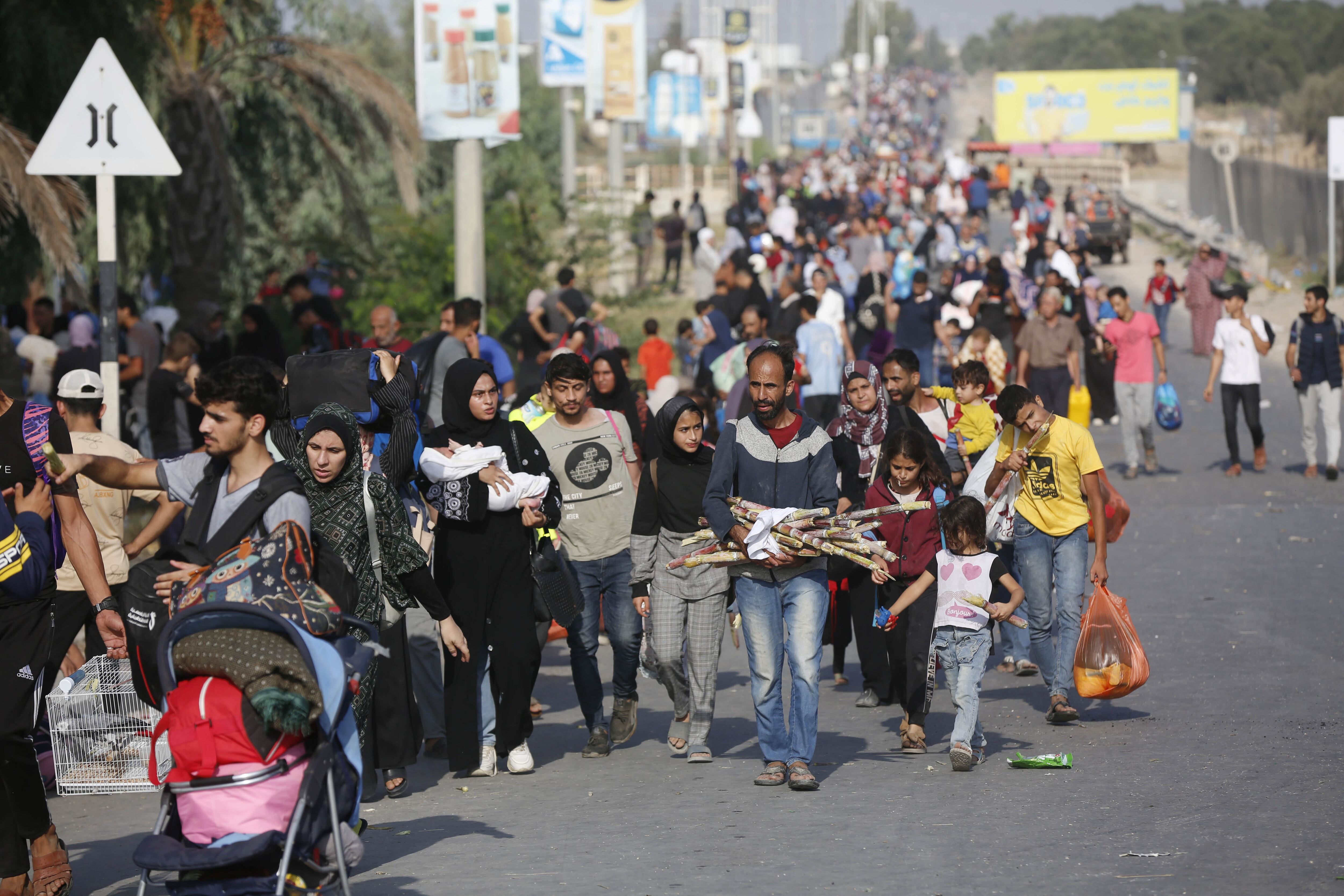 GAZA CITY, GAZA - NOVEMBER 08: Palestinians leave from the northern part of the Gaza to flee the central and southern parts of the Gaza Strip on November 08, 2023. Since Oct.7, the Israeli army's attacks have caused significant damage in the northern part of the Gaza Strip, making it difficult for civilians living in the region to move to the south. (Photo by Ashraf Amra/Anadolu via Getty Images)