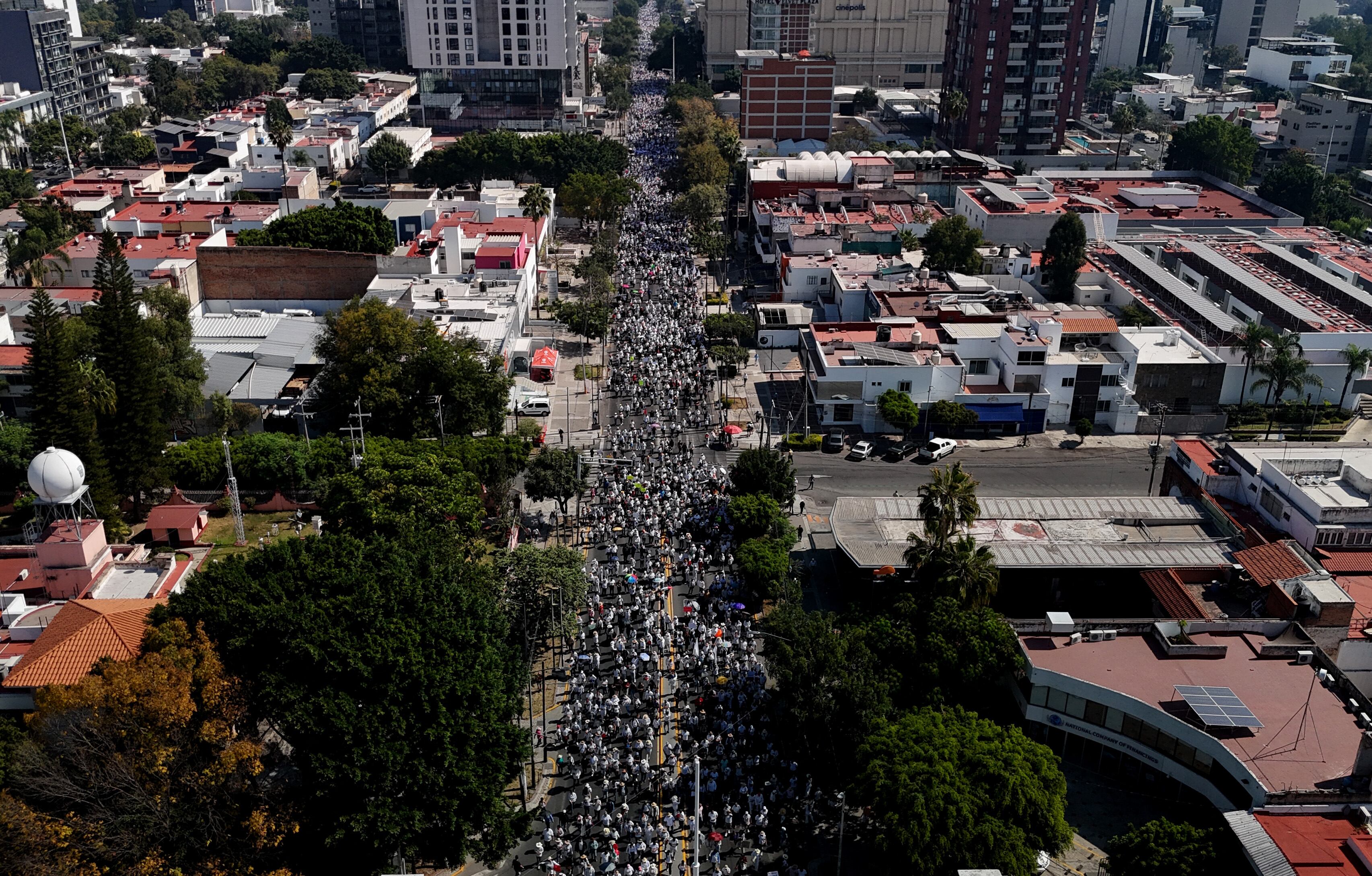 This aerial view shows the �For Peace� protest organized by Generation Z against the government of Mexican President Claudia Sheinbaum in Guadalajara, Jalisco, Mexico on November 14, 2025. (Photo by ULISES RUIZ / AFP)