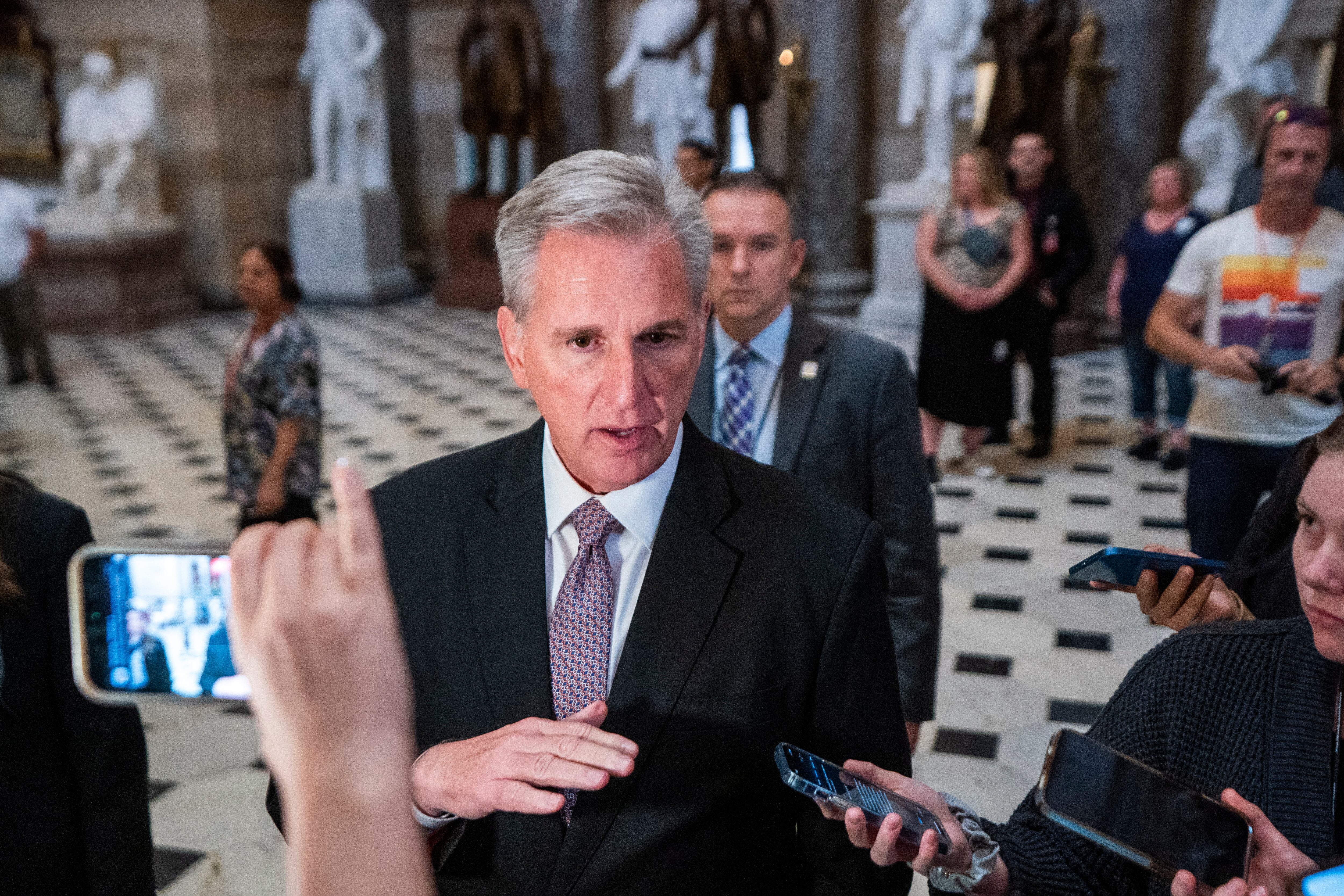 Washington (United States), 02/10/2023.- Speaker of the House Kevin McCarthy responds to a question from the news media as he walks to the House floor in the US Capitol in Washington, DC, USA, 02 October 2023. Earlier in the day, Republican Representative from Florida Matt Gaetz used a floor speech to threaten the use of a motion to vacate to try and strip Speaker of the House McCarthy of his speakership. EFE/EPA/SHAWN THEW