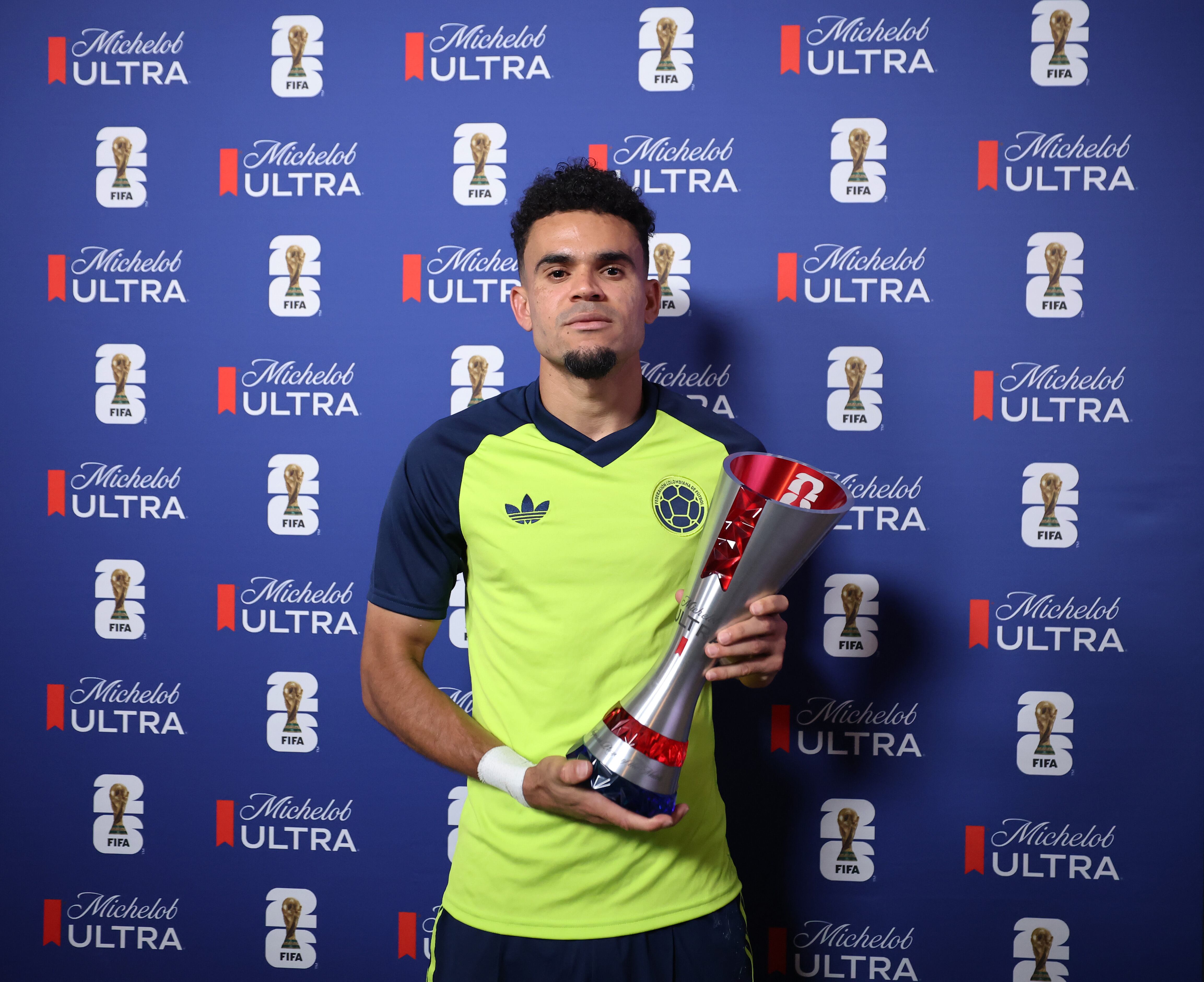 MEXICO CITY, MEXICO - JUNE 17: Luis Diaz #7 of Colombia  poses for a photograph with the Superior Player of the Match award after the FIFA World Cup 2026 Group K match between Uzbekistan and Colombia at Mexico City Stadium on June 17, 2026 in Mexico City, Mexico. (Photo by Hector Vivas - FIFA/FIFA via Getty Images)