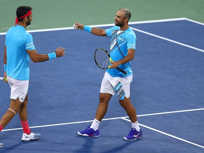 Robert Farah y Juan Sebastián Cabal durante su más reciente título en el Torneo de Dubái.
