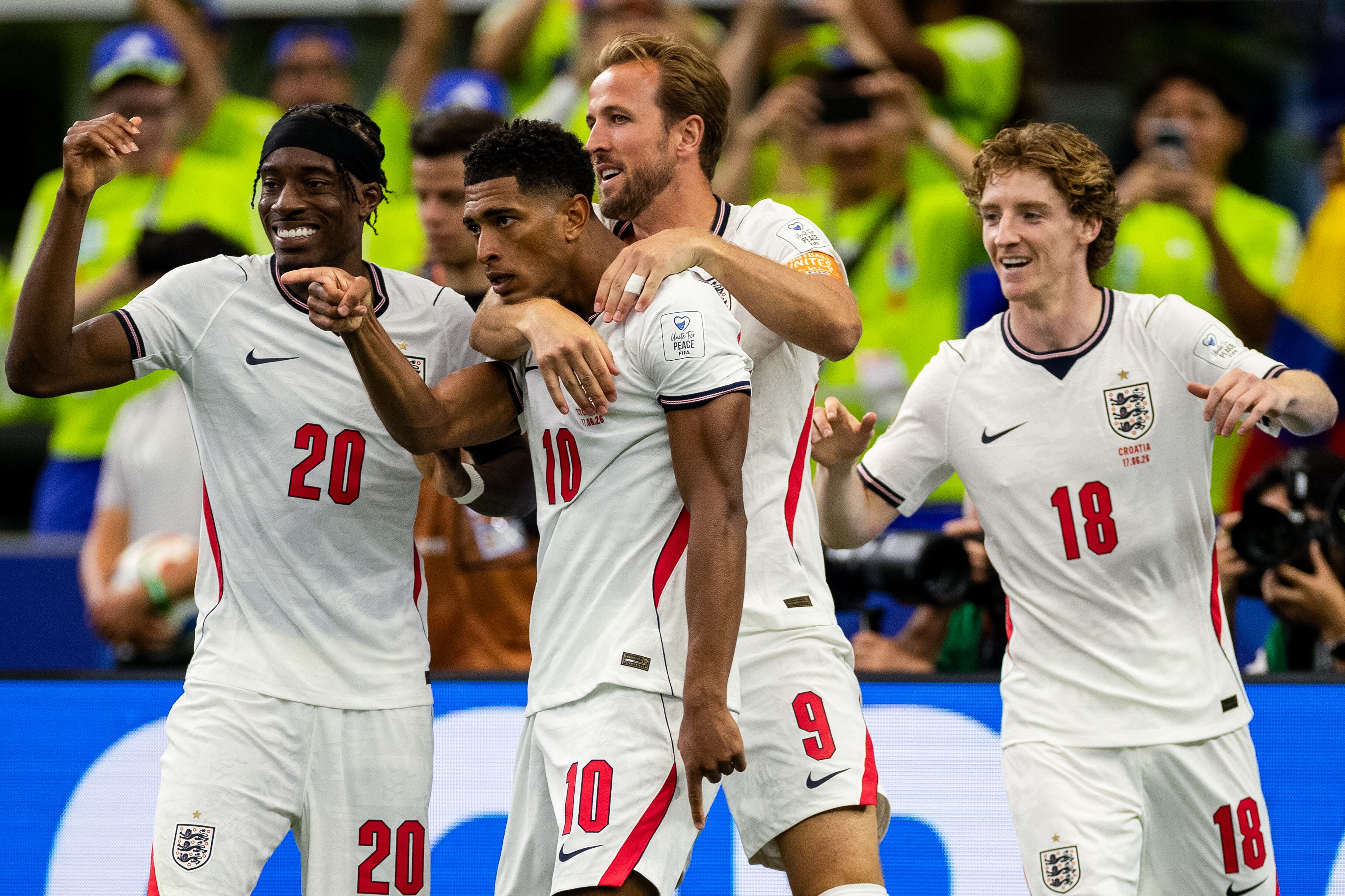 DALLAS, TEXAS - JUNE 17: Jude Bellingham of England celebrates with Noni Madueke of England, Harry Kane of England and Anthony Gordon of England after scoring his team's third goal during the FIFA World Cup 2026 Group L match between England and Croatia at Dallas Stadium on June 17, 2026 in Dallas, Texas. (Photo by MB Media/Getty Images)