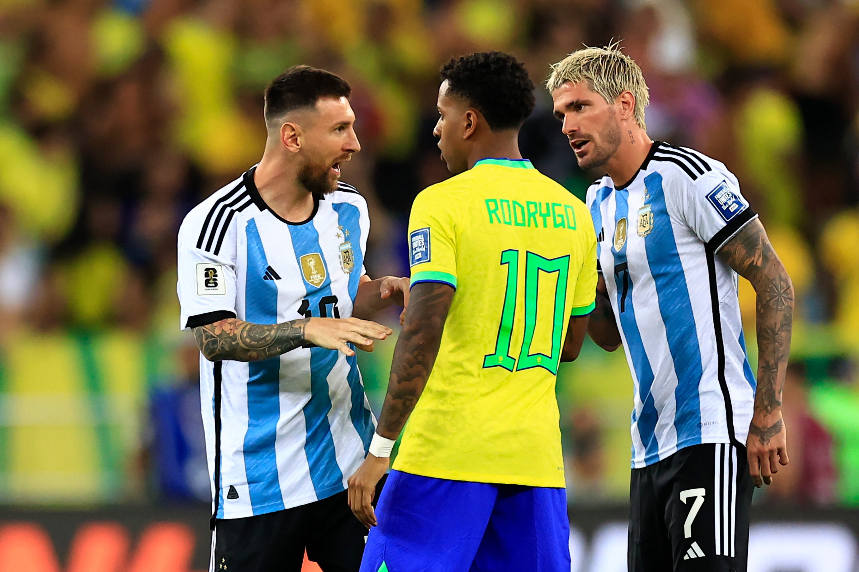 Lionel Messi, Rodrigo de Paul y Rodrygo/Getty Images.