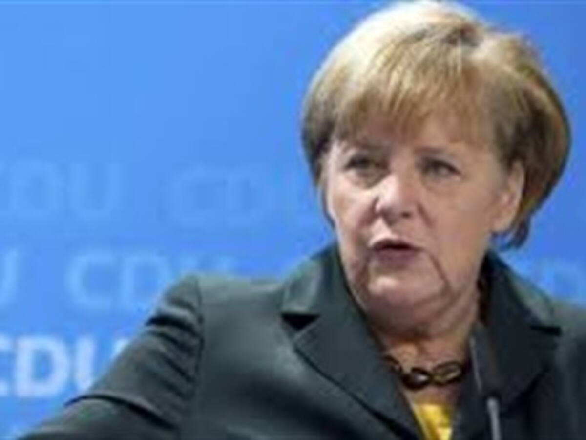 Merkel asumió hoy su tercer mandato rodeada de una coalición imbatible