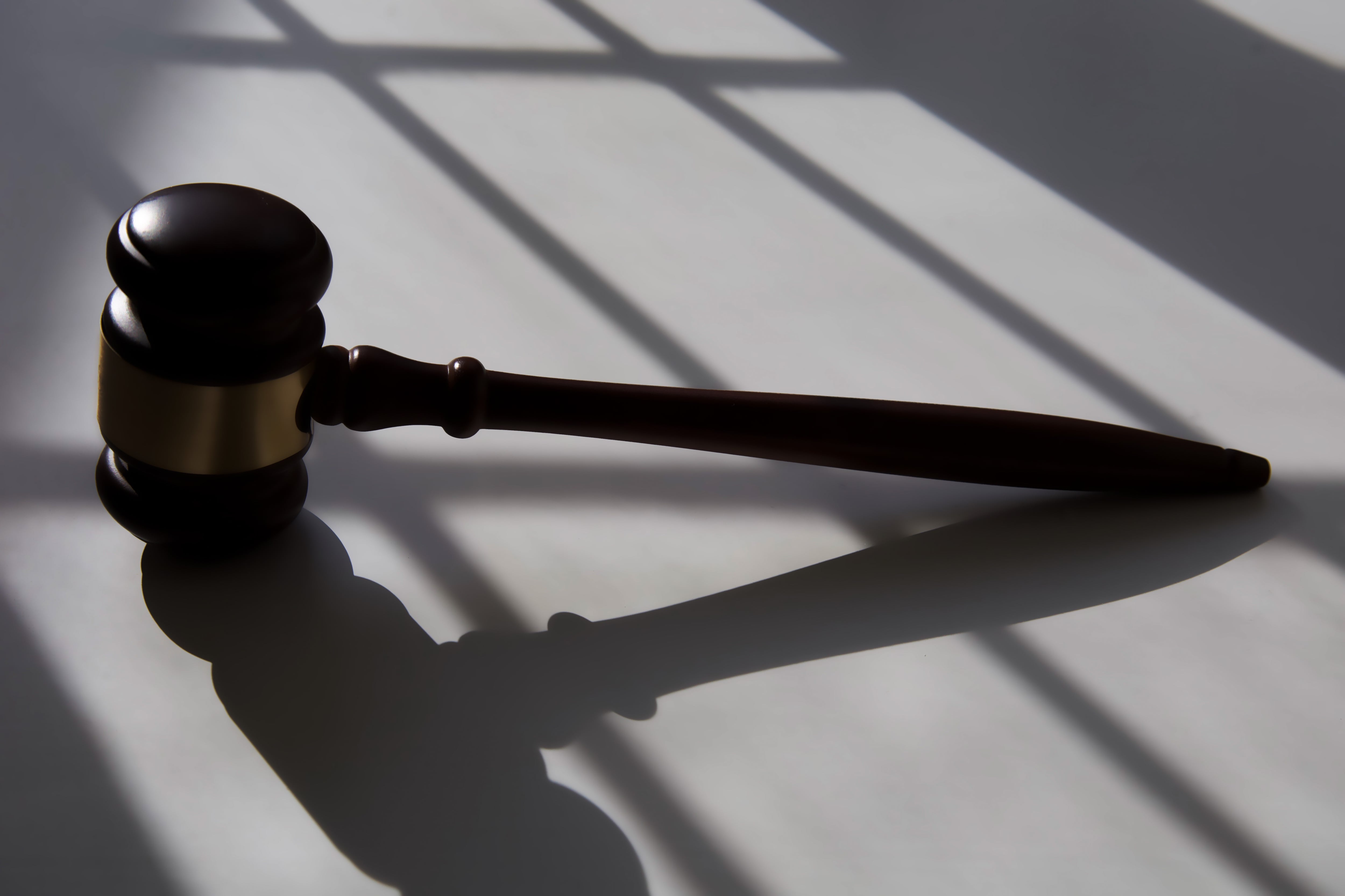 gold-trimmed wooden judicial gavel. Photo: Getty Images