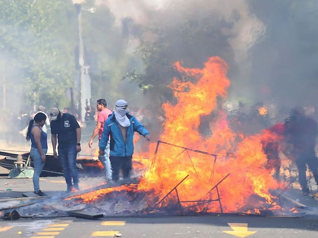 Colombiano habría muerto durante las protestas en Chile
