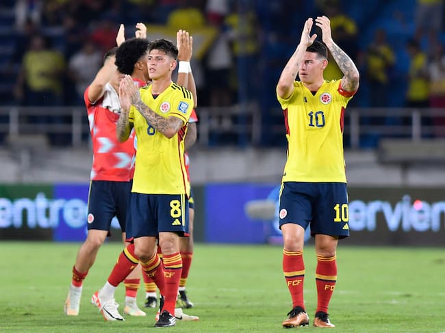 BARRANQUILLA, COLOMBIA - SEPTEMBER 07: Jorge Carrascal and James Rodriguez of Colombia acknowledge the fans after a FIFA World Cup 2026 Qualifier match between Colombia and Venezuela at Metropolitano Stadium on September 07, 2023 in Barranquilla, Colombia. (Photo by Gabriel Aponte/Getty Images)