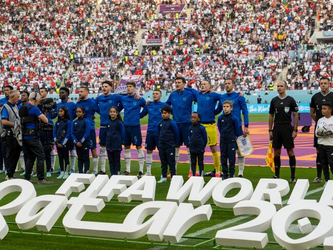 DOHA, QATAR - NOVEMBER 21: England team line up for the national anthem during the FIFA World Cup Qatar 2022 Group B match between England and IR Iran at Khalifa International Stadium on November 21, 2022 in Doha, Qatar. (Photo by Sebastian Frej/MB Media/Getty Images)