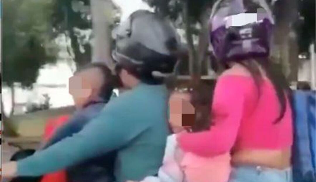 Motos hasta con 5 personas transitan en las calles de Cali