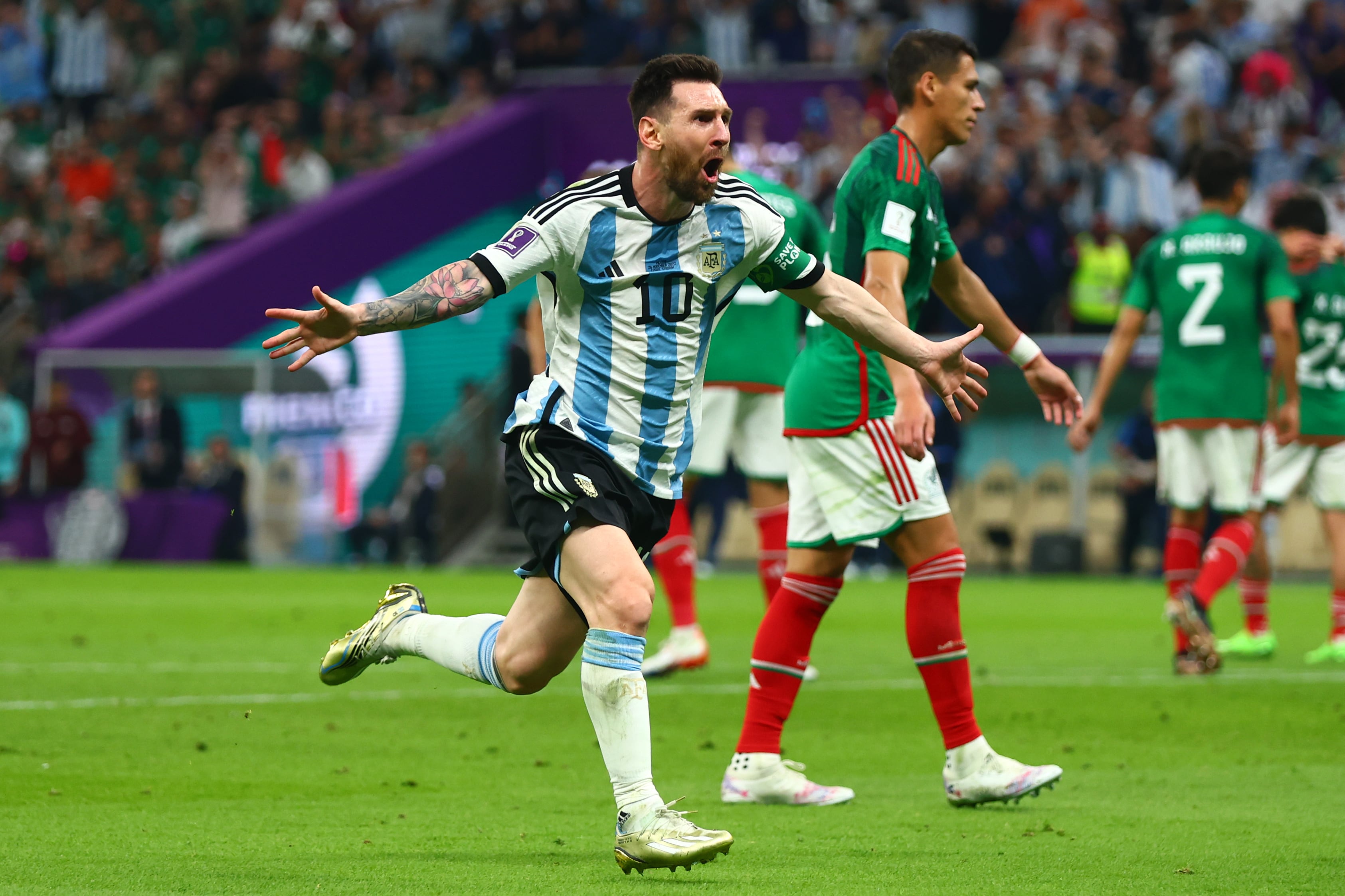LUSAIL CITY, QATAR - NOVEMBER 26:   Lionel Messi of Argentina celebrates scoring the opening goal  during the FIFA World Cup Qatar 2022 Group C match between Argentina and Mexico at Lusail Stadium on November 26, 2022 in Lusail City, Qatar. (Photo by Chris Brunskill/Fantasista/Getty Images)