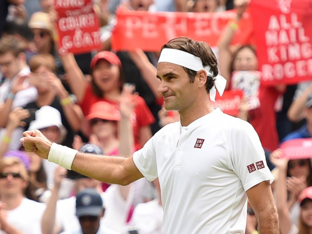 Federer avanza a tercera ronda y aumenta récord en Wimbledon