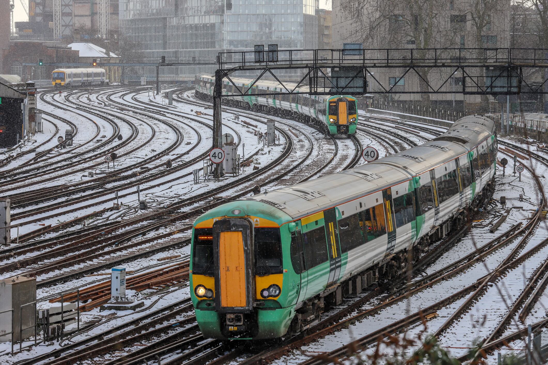 Snow covered rail tracks on outskirts of Victoria Station in central London - disruption was caused to rail services throughout the UK on 28 February 2018 due to heavy snowfall and below freezing temperatures