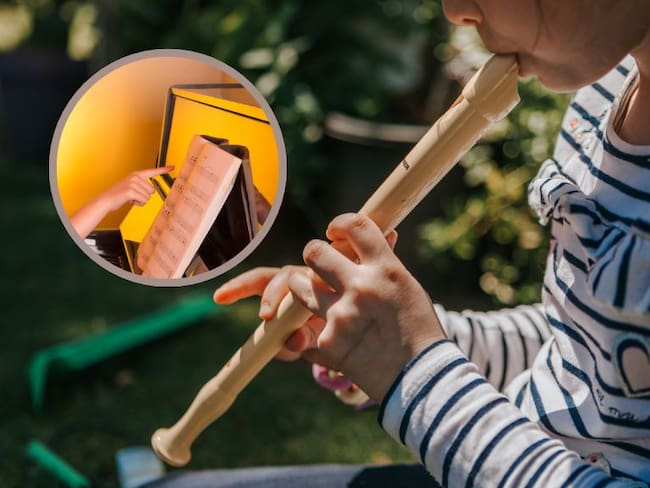 Niño tocando una flauta/ Mano señalando una partitura // Imagenes de referencia //Getty Images