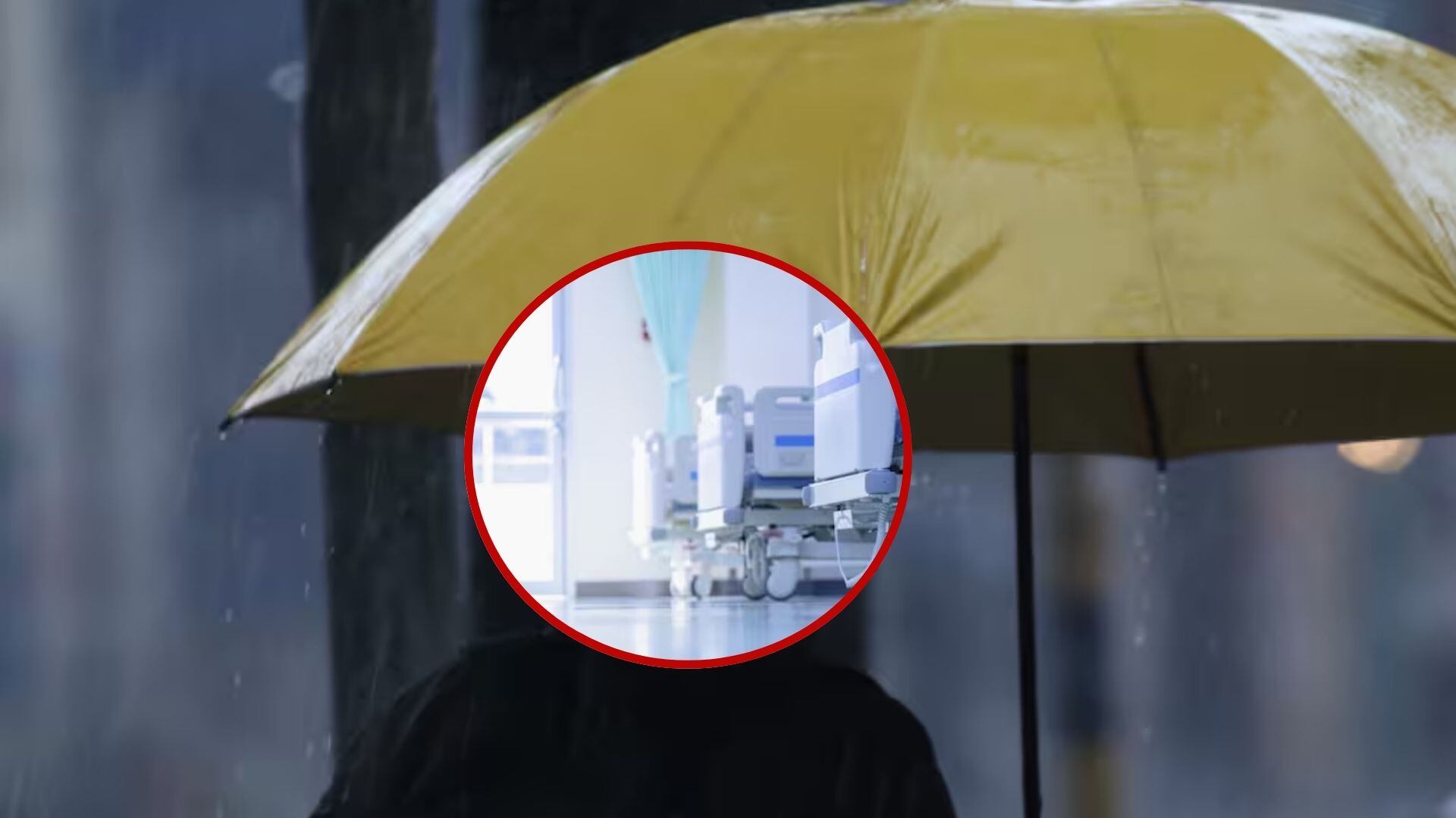 Hospital y persona con sombrilla - Getty Images