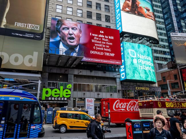 NEW YORK, NEW YORK - JUNE 22: Ahead of the first anniversary of the Supreme Court's decision overturning Roe vs Wade on Saturday, the Democratic National Committee launches a billboard in Times Square highlighting Donald Trump and other GOP hopefuls' support for a national abortion ban at Times Square on June 22, 2023 in New York City. (Photo by Roy Rochlin/Getty Images for DNC)