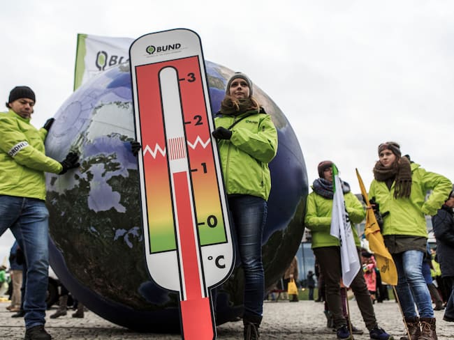 Manifestaciones criticando la falta de compromiso para frenar el cambio climático. 
(Foto: Carsten Koall/Getty Images)