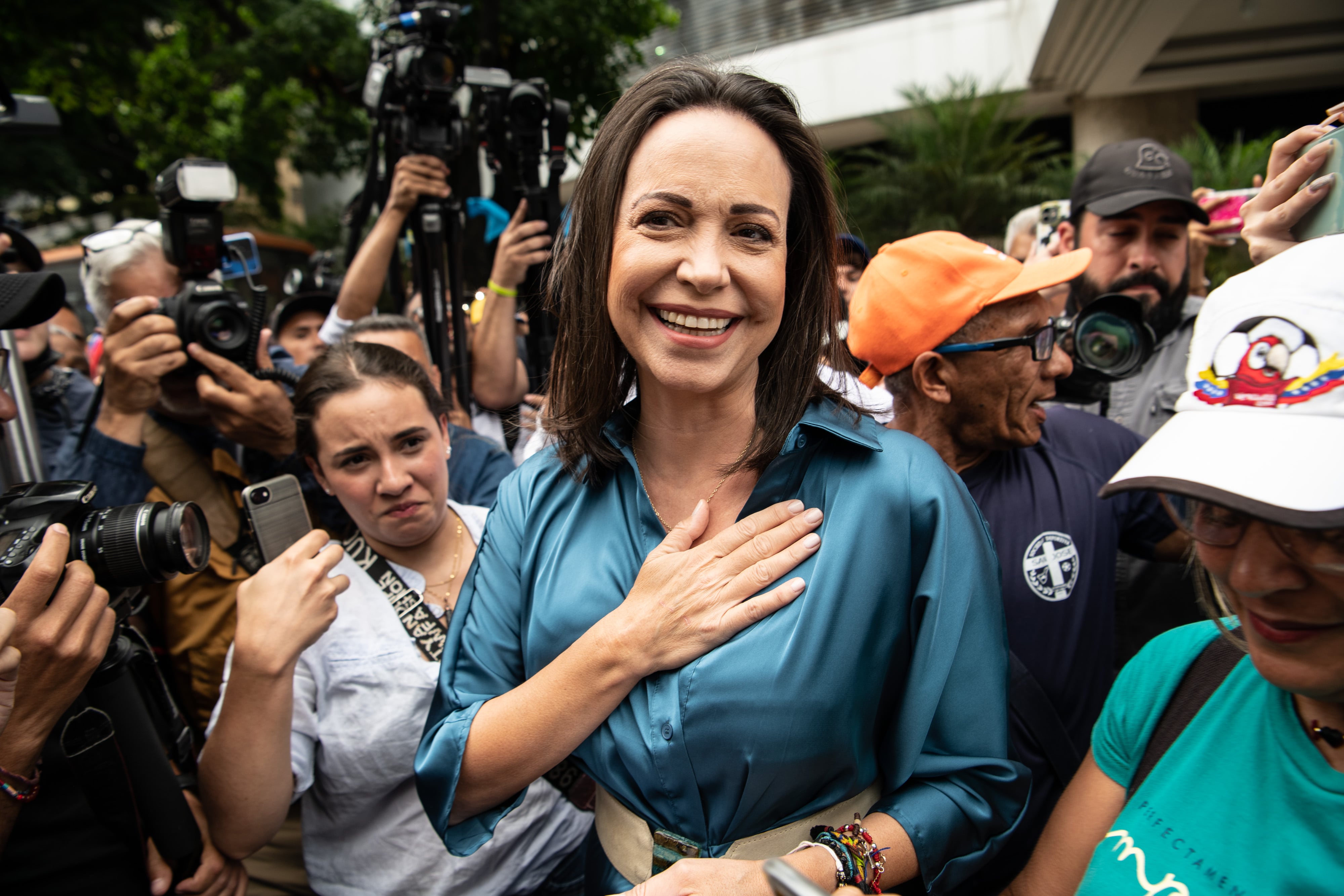 CARACAS, VENEZUELA - JUNE 23: Opposition leader Maria Corina Machado gestures as she arrives to a rally on June 23, 2023 in Caracas, Venezuela. The opposition called primary elections for October looking to face Maduro as a joint front in the 2024 presidential elections. Machado currently leads the polls. (Photo by Carlos Becerra/Getty Images)