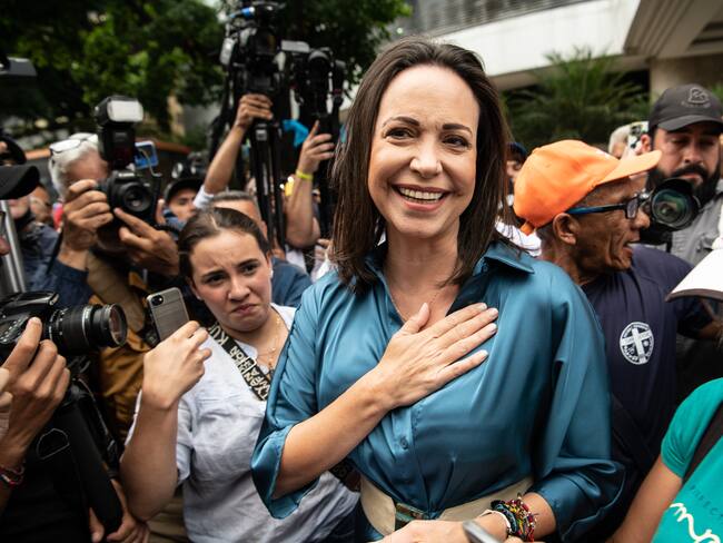 CARACAS, VENEZUELA - JUNE 23: Opposition leader Maria Corina Machado gestures as she arrives to a rally on June 23, 2023 in Caracas, Venezuela. The opposition called primary elections for October looking to face Maduro as a joint front in the 2024 presidential elections. Machado currently leads the polls. (Photo by Carlos Becerra/Getty Images)