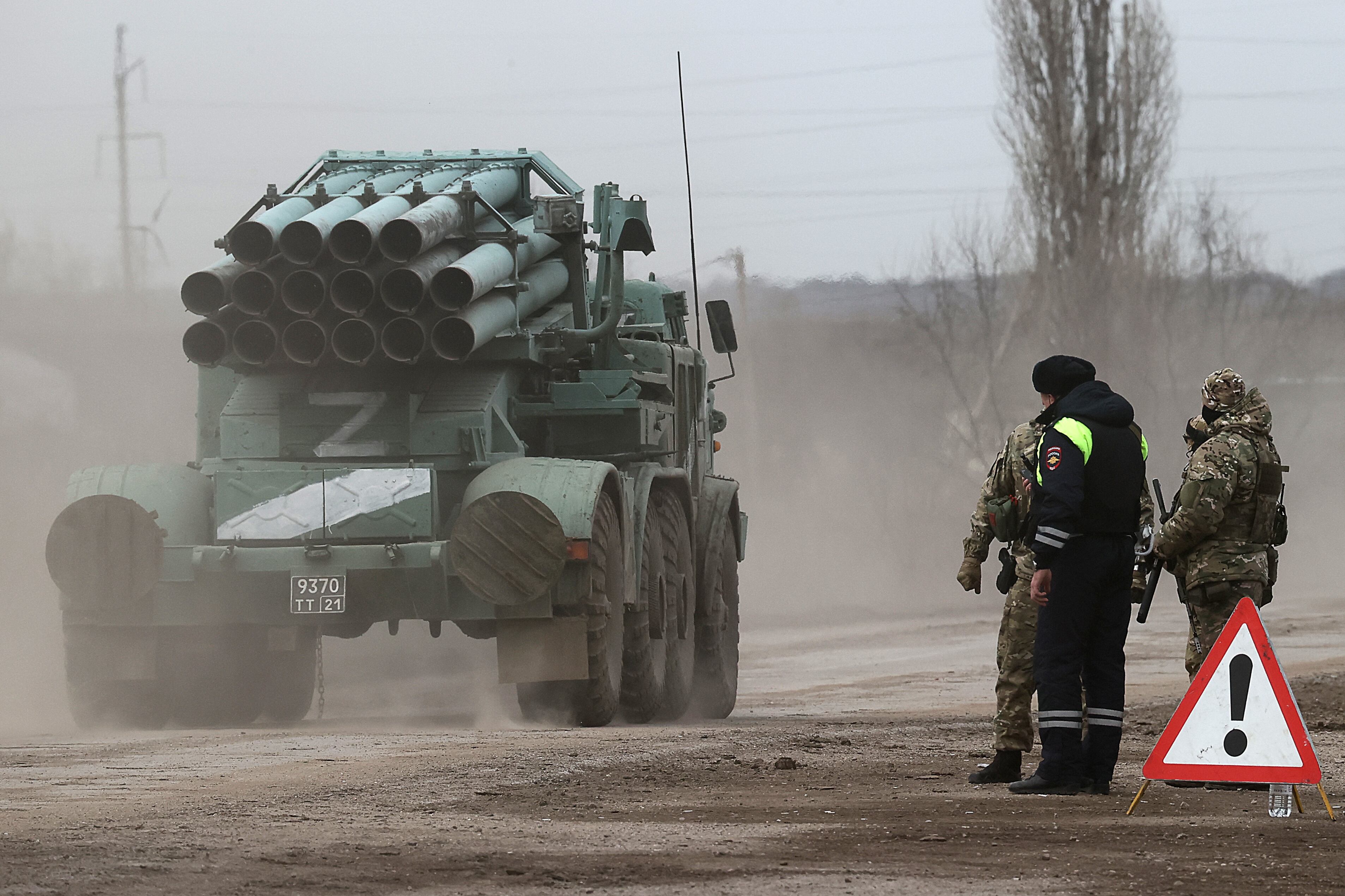 CRIMEA, RUSSIA - FEBRUARY 24, 2022: An armoured vehicle passes a police post in the town of Armyansk, northern Crimea. Early on February 24, President Putin announced a special military operation to be conducted by the Russian Armed Forces in response to appeals for help from the leaders of the Donetsk and Lugansk People's Republics. Sergei Malgavko/TASS (Photo by Sergei Malgavko\TASS via Getty Images)