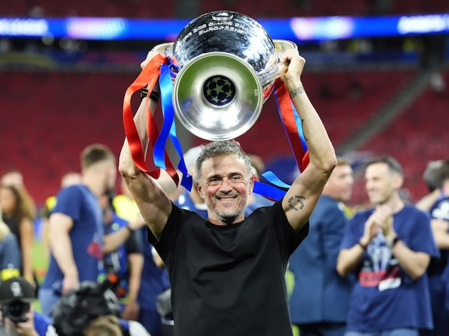 Paris Saint-Germain manager Luis Enrique celebrates with the trophy following victory over Arsenal after the UEFA Champions League Final at the Puskas Arena, Budapest. Picture date: Saturday May 30, 2026. (Photo by Nick Potts/PA Images via Getty Images)