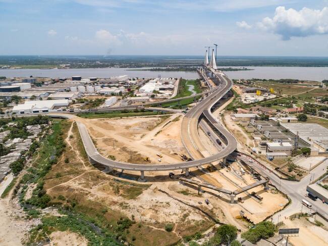 Con la Ley 113 de 1962 presentada por el senador del Atlántico Alberto Pumarejo se decide llevar a cabo el puente.