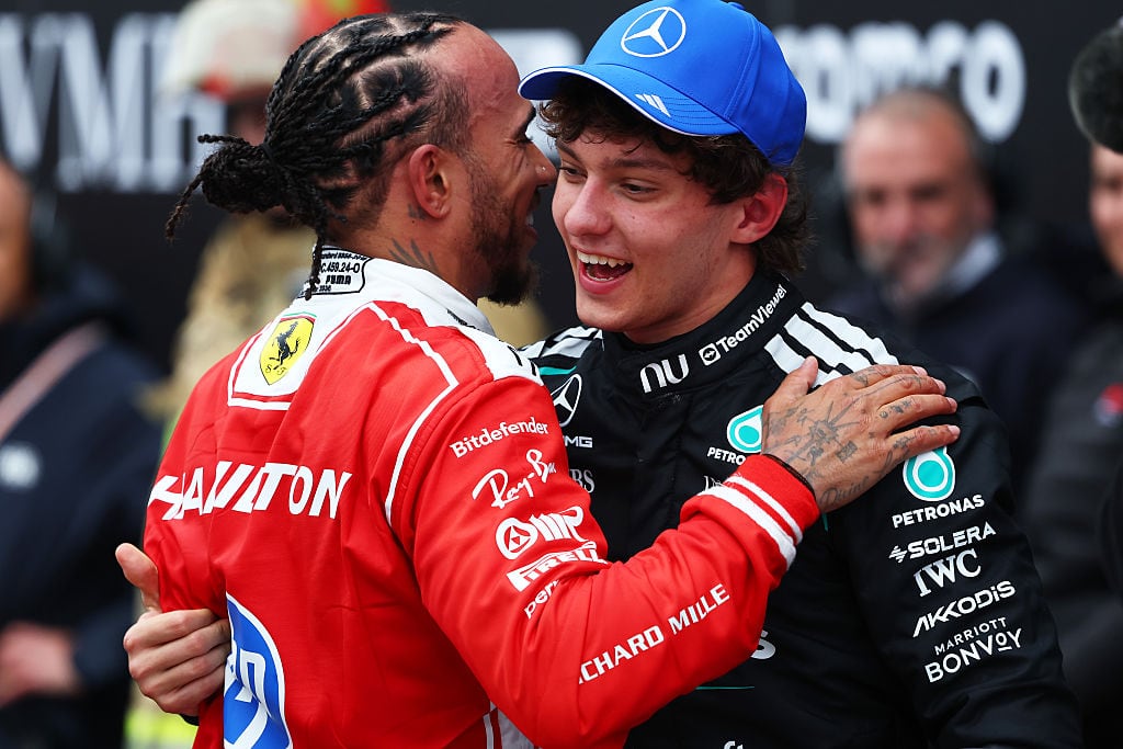 MONTREAL, QUEBEC - MAY 24: Race winner Andrea Kimi Antonelli of Italy and Mercedes AMG Petronas F1 Team and Second placed Lewis Hamilton of Great Britain and Scuderia Ferrari talk in parc ferme during the F1 Grand Prix of Canada at Circuit Gilles-Villeneuve on May 24, 2026 in Montreal, Quebec. (Photo by Jordan McKean/LAT Images)