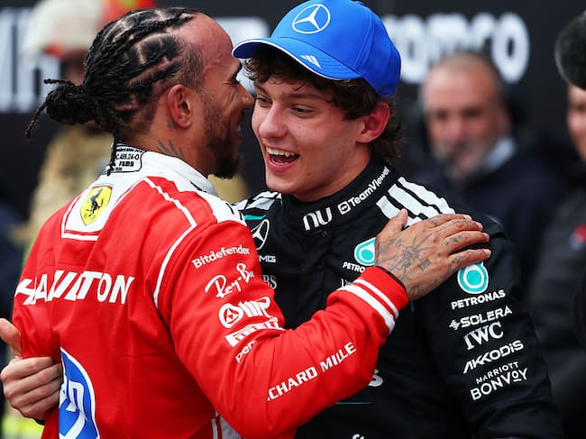 MONTREAL, QUEBEC - MAY 24: Race winner Andrea Kimi Antonelli of Italy and Mercedes AMG Petronas F1 Team and Second placed Lewis Hamilton of Great Britain and Scuderia Ferrari talk in parc ferme during the F1 Grand Prix of Canada at Circuit Gilles-Villeneuve on May 24, 2026 in Montreal, Quebec. (Photo by Jordan McKean/LAT Images)