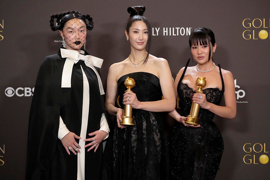 BEVERLY HILLS, CALIFORNIA - JANUARY 11: (FOR EDITORIAL USE ONLY) (L-R) Audrey Nuna, Ejae and Rei Ami, winners of the Best Original Song - Motion Picture for "Golden" from "KPop Demon Hunters," pose in the press room at the 83rd Annual Golden Globe Awards at The Beverly Hilton on January 11, 2026 in Beverly Hills, California. (Photo by Jeff Kravitz/FilmMagic)