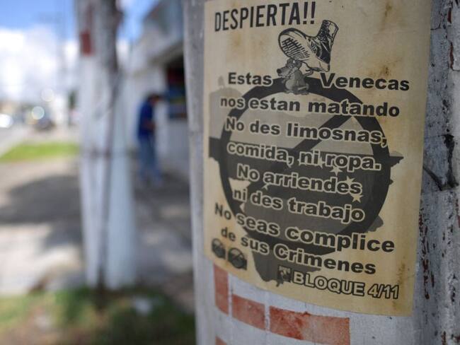 En Bogotá se repartieron panfletos pidiendo no ayudar a los migrantes venezolanos.