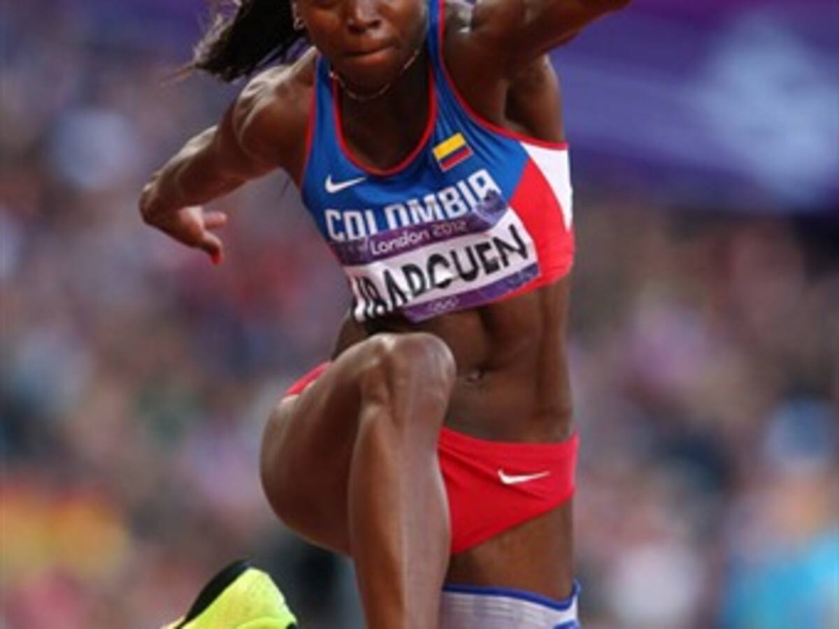 Ciro Solano, un "duro" del atletismo en Colombia, al lado de Caterine Ibargüen