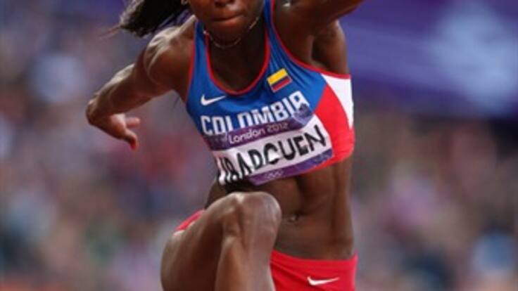 Ciro Solano, un "duro" del atletismo en Colombia, al lado de Caterine Ibargüen