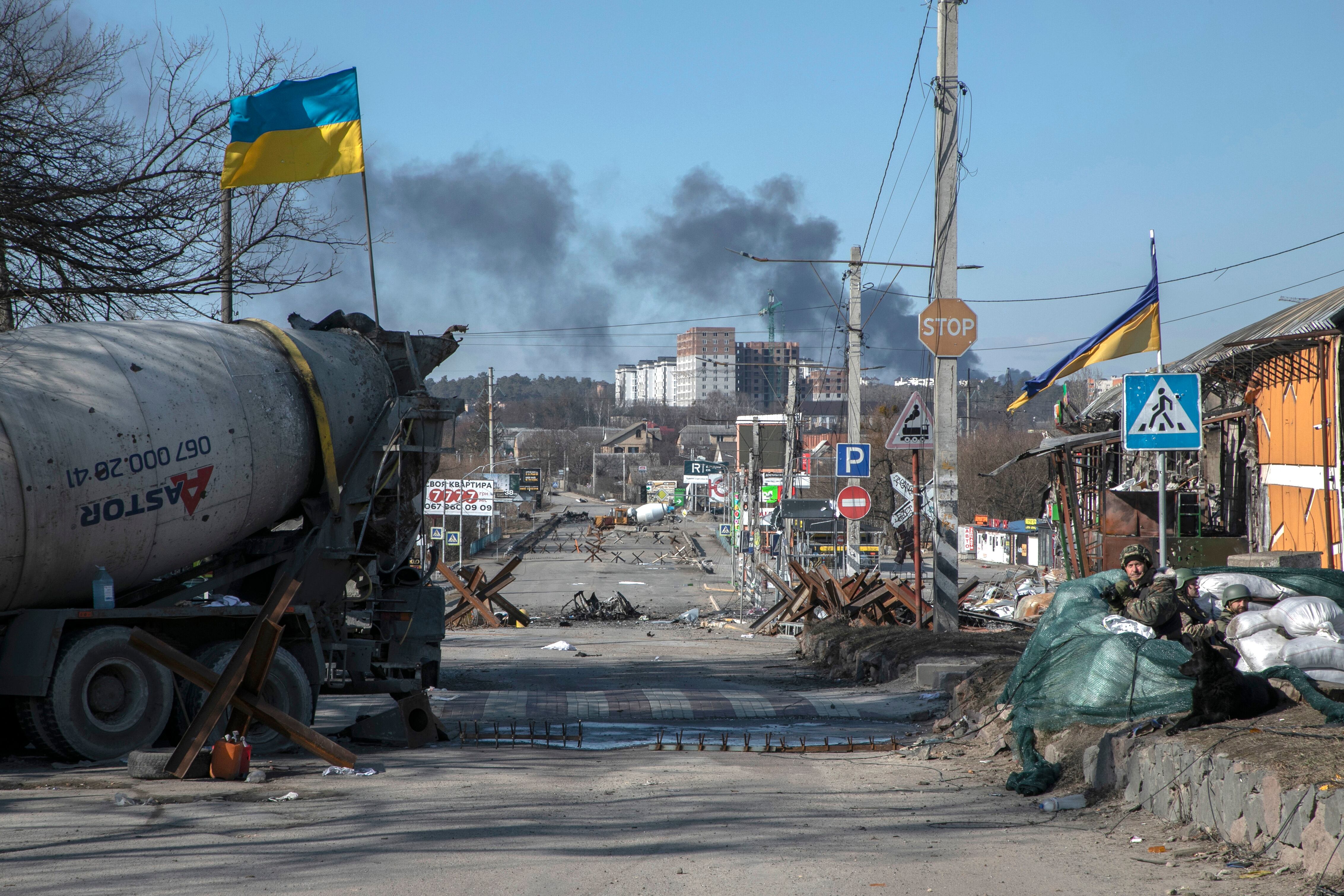 IRPIN,UKRAINE - MARCH 11:  [FRANCE OUT] IMAGES EMBARGOED FROM USAGE IN FRANCE FOR 30 DAYS FROM CAPTURE DATE) Smoke in the distance from the shelling of the town of Boutcha on March 11,2022 in Irpin, Ukraine.  Russia continues its assault on Ukraine's major cities, including the capital Kyiv, after launching a large-scale invasion of the country on February 24. (Photo by Laurent Van der Stockt pour Le Monde/Getty Images)