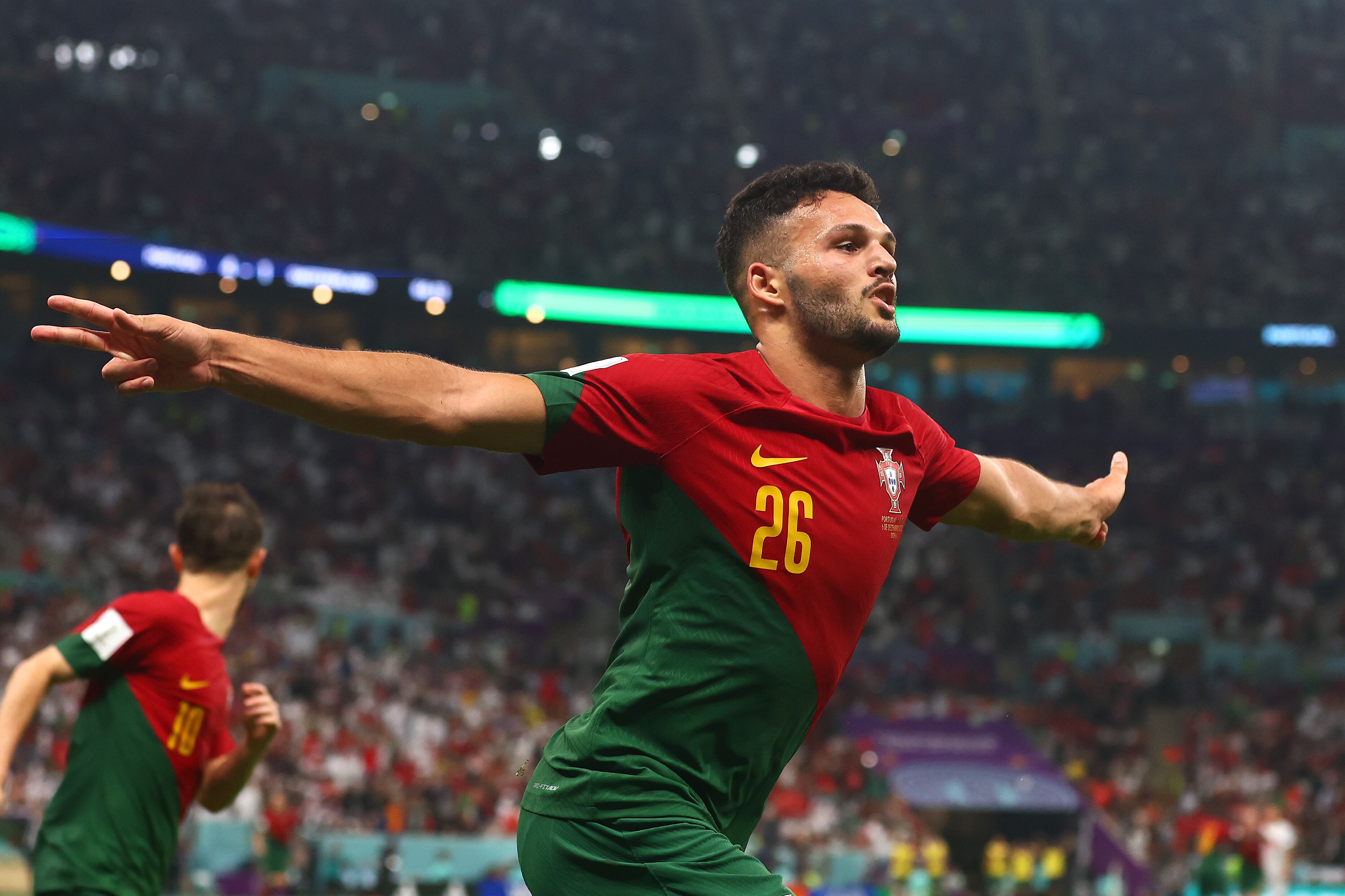 LUSAIL CITY, QATAR - DECEMBER 06:   Goncalo Ramos of Portugal celebrates scoring his sides fifth goal during the FIFA World Cup Qatar 2022 Round of 16 match between Portugal and Switzerland at Lusail Stadium on December 6, 2022 in Lusail City, Qatar. (Photo by Chris Brunskill/Fantasista/Getty Images)
