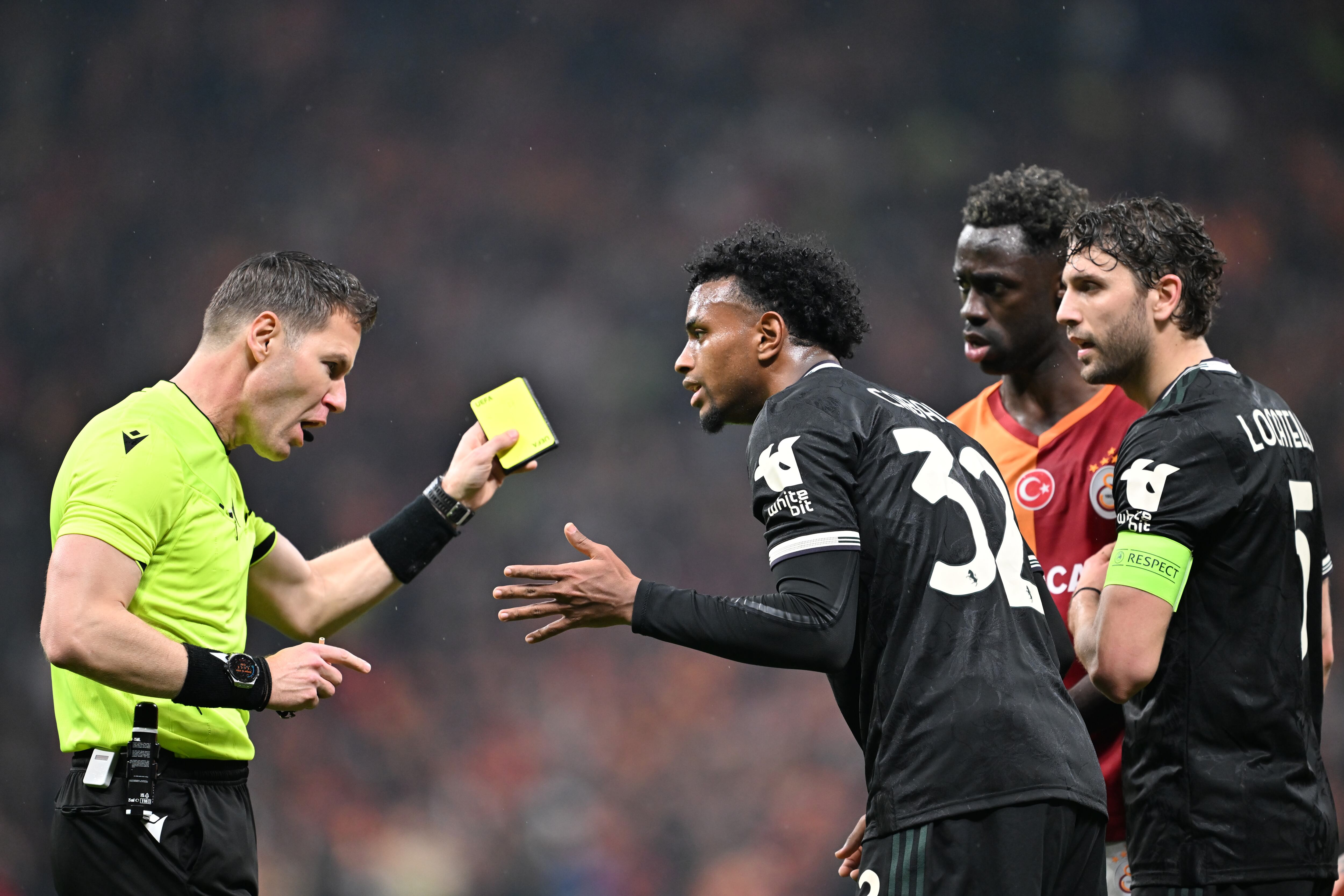 ISTANBUL, TURKIYE - FEBRUARY 17: Juan Cabal (32) of Juventus chats with referee Danny Makkelie (L) during UEFA Champions League last 16 playoff round first leg football match between Galatasaray and Juventus at RAMS Park in Istanbul, Turkiye on February 17, 2026. (Photo by Isa Terli/Anadolu via Getty Images)