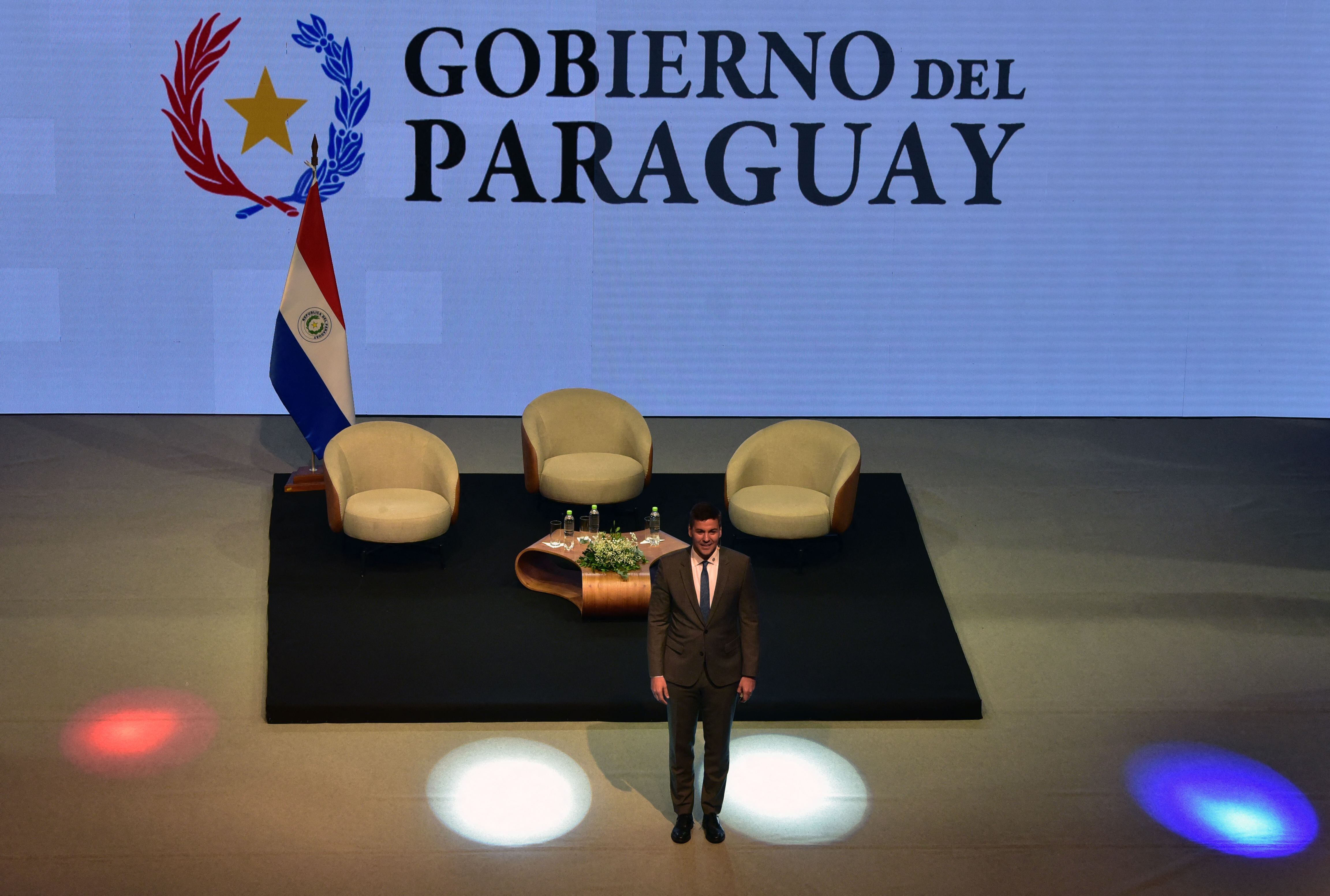 Paraguay's President Santiago Peña stands before making a presentation of his government at the Central Bank of Paraguay in Asuncion on August 16, 2023, a day after taking office. (Photo by Norberto DUARTE / AFP) (Photo by NORBERTO DUARTE/AFP via Getty Images)