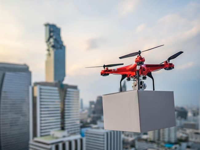 Drones carry express packages in city
