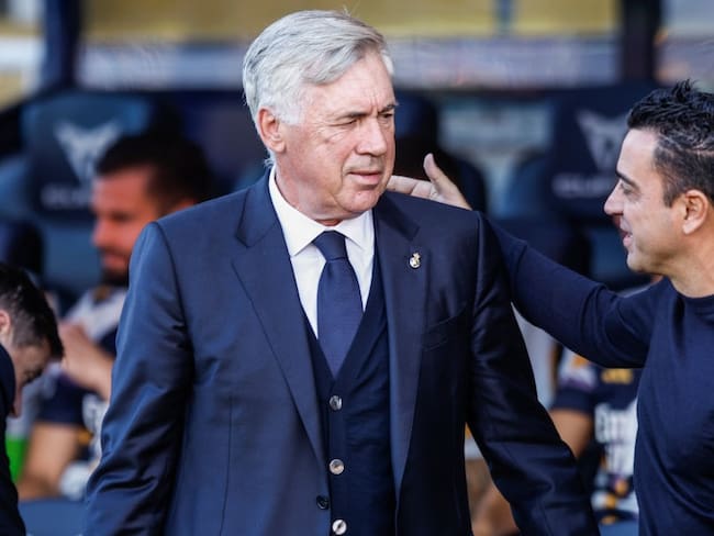 Carlo Ancelotti y Xavi Hernández / Getty Images
