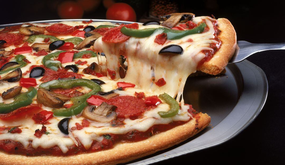 La pizza es tendencia: Es entregada por robots y preparada por máquinas