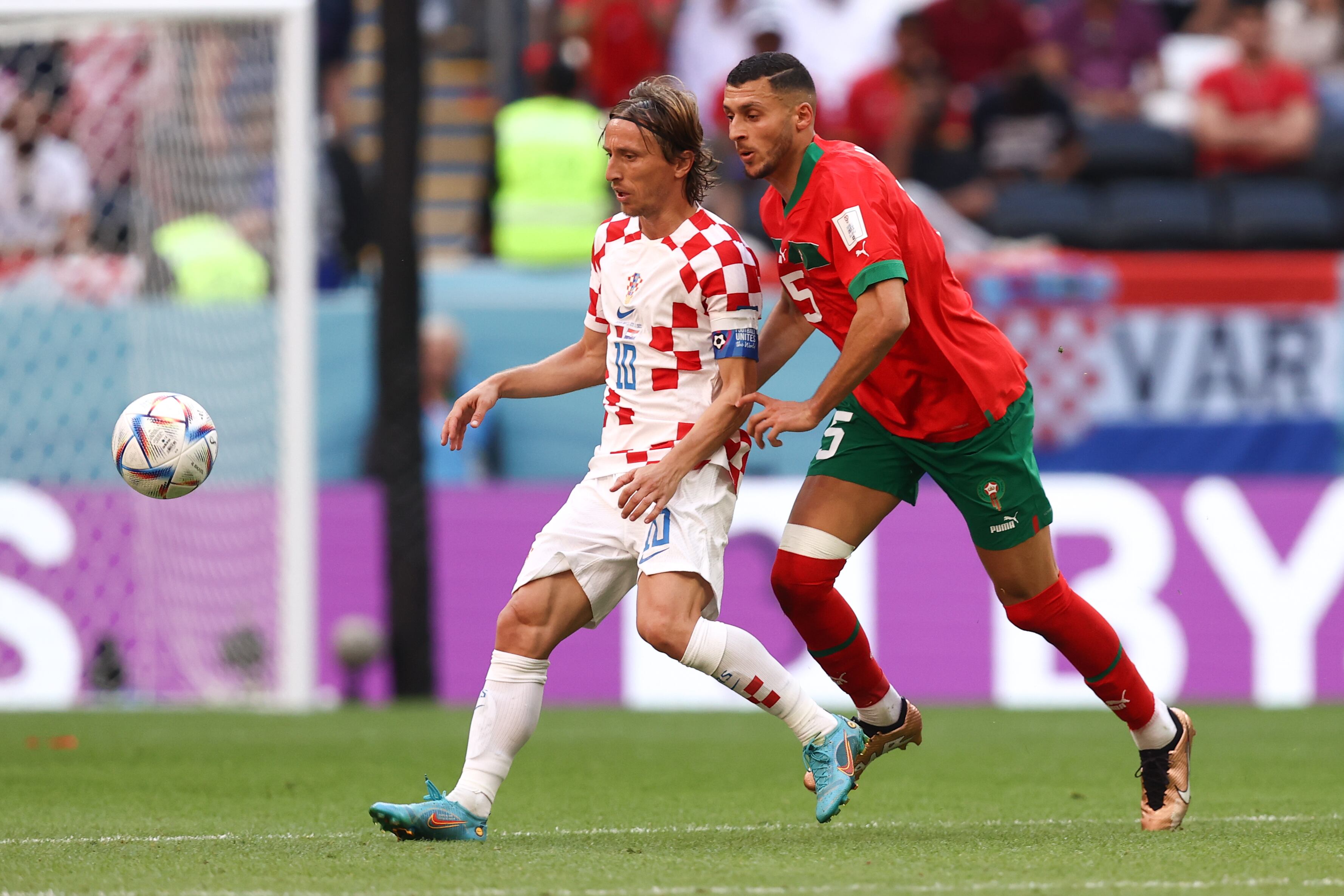 AL KHOR, QATAR - NOVEMBER 23: Luka Modric of Croatia and Selim Amallah of Morocco during the FIFA World Cup Qatar 2022 Group F match between Morocco and Croatia at Al Bayt Stadium on November 23, 2022 in Al Khor, Qatar. (Photo by James Williamson - AMA/Getty Images)