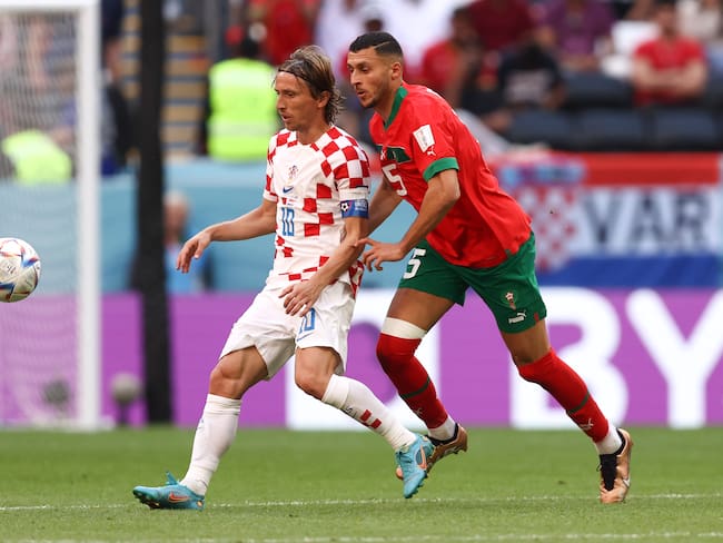 AL KHOR, QATAR - NOVEMBER 23: Luka Modric of Croatia and Selim Amallah of Morocco during the FIFA World Cup Qatar 2022 Group F match between Morocco and Croatia at Al Bayt Stadium on November 23, 2022 in Al Khor, Qatar. (Photo by James Williamson - AMA/Getty Images)