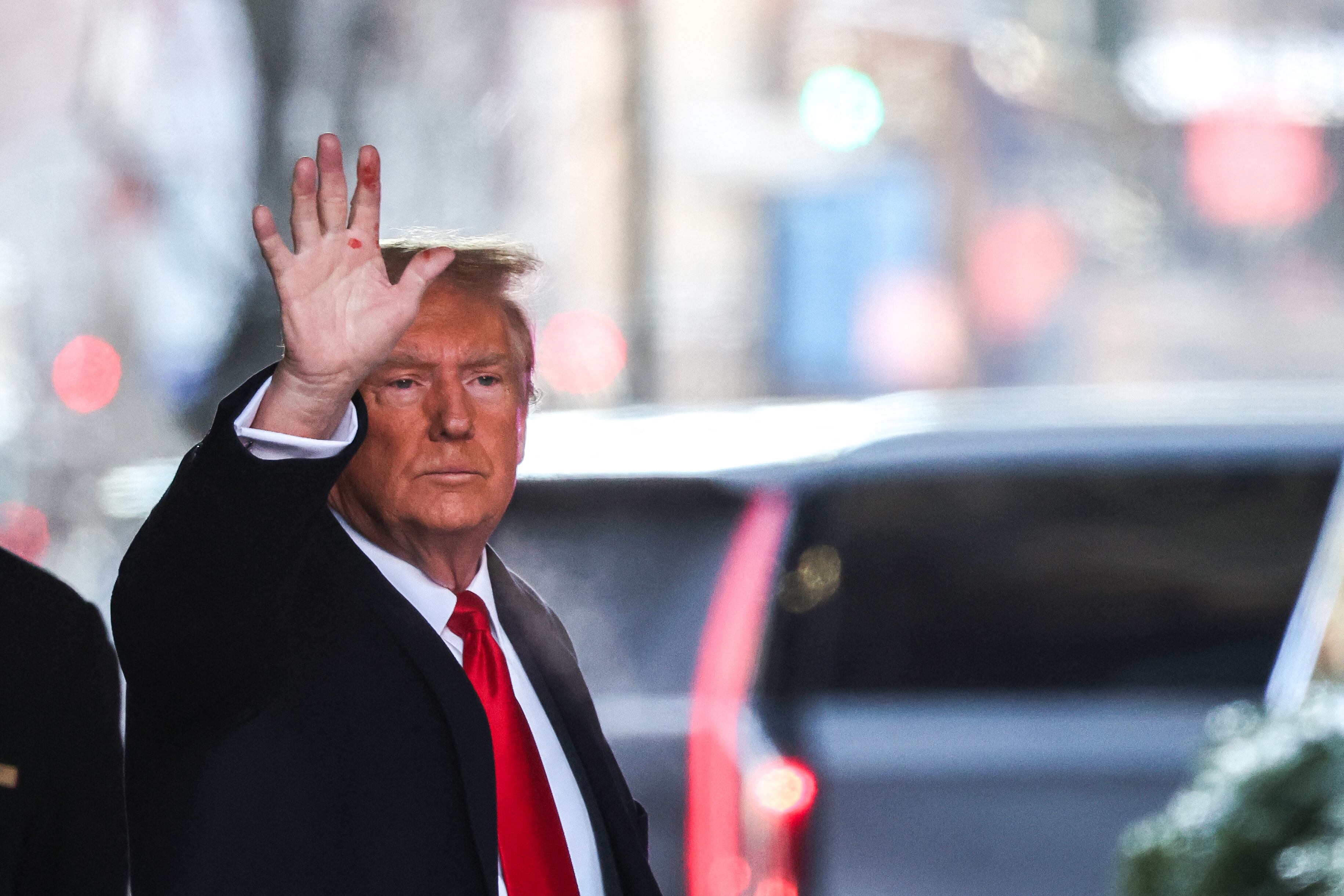 Former US President Donald Trump leaves Trump Tower for Manhattan federal court for the second defamation trial against him, in New York City on January 17, 2024. Writer E. Jean Carroll is seeking more than $10 million in damages in the civil trial, alleging that Trump defamed her in 2019 when he was president and she had just come out with her allegation, saying she "is not my type."  This is separate to a civil case last year where another New York jury found Trump liable for sexually assaulting Carroll in a department store dressing room in 1996 and subsequently defaming her in 2022, when he called her a "complete con job." (Photo by Charly TRIBALLEAU / AFP) (Photo by CHARLY TRIBALLEAU/AFP via Getty Images)