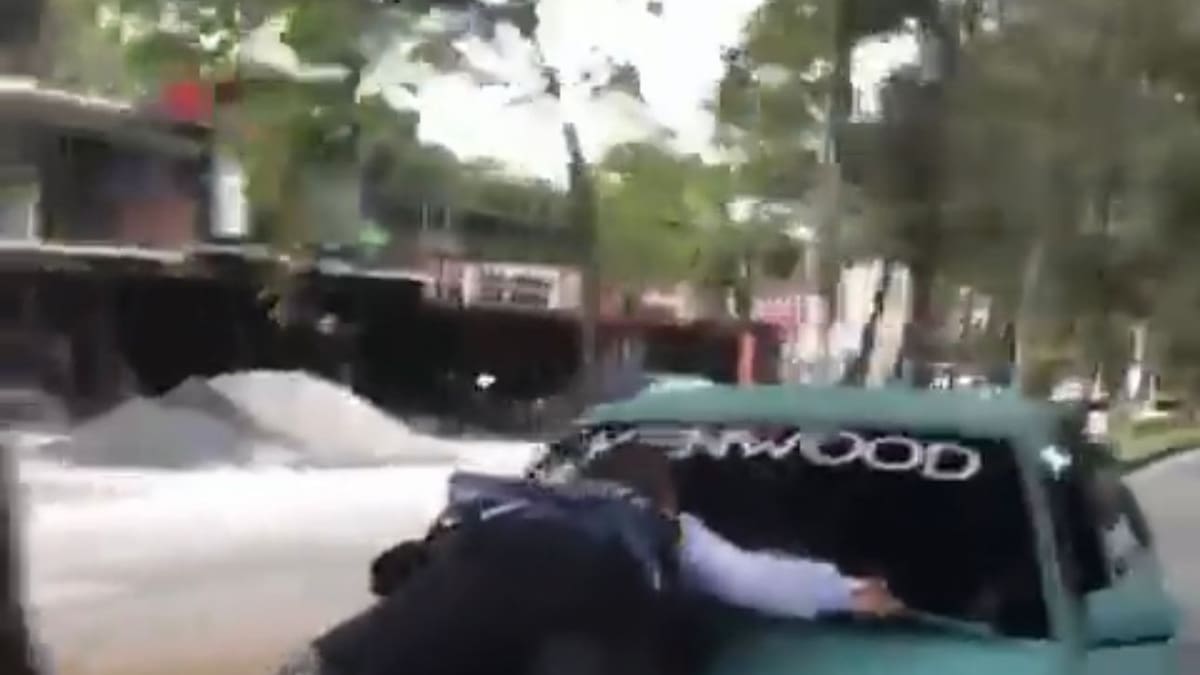 Palmira: agente de tránsito se aferró al capó de un vehículo cuando intentaron arrollarlo