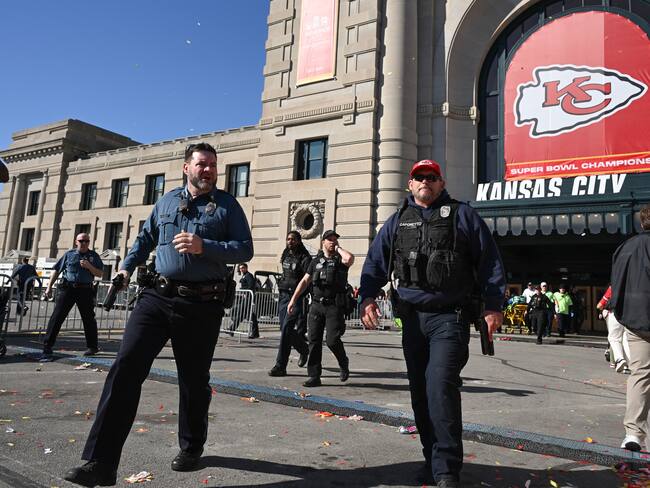 Police respond to shots fired near the Kansas City Chiefs' Super Bowl LVIII victory parade on February 14, 2024, in Kansas City, Missouri. (Photo by ANDREW CABALLERO-REYNOLDS / AFP)