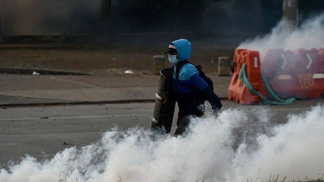 “Hemos tenido pérdidas demasiado grandes porque no hemos podido producir”: Julio, empresario de Cali. Foto: Getty Images / LUIS ROBAYO