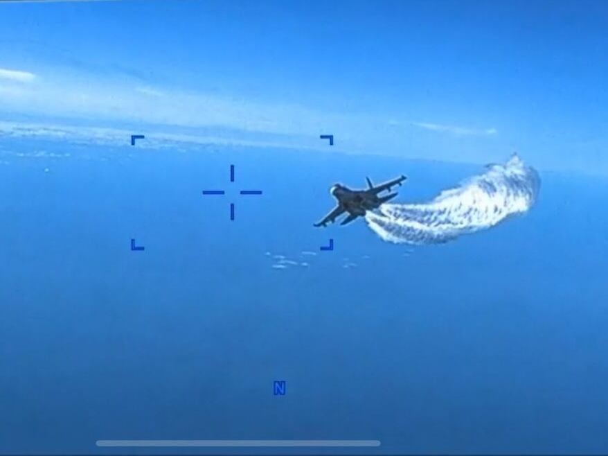 Camera footage release from U.S. Air Force MQ-9 interaction with Russian SU-27 in Black Sea.