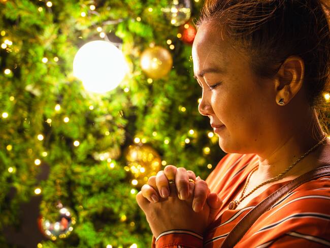 Oración en Navidad / Getty Images
