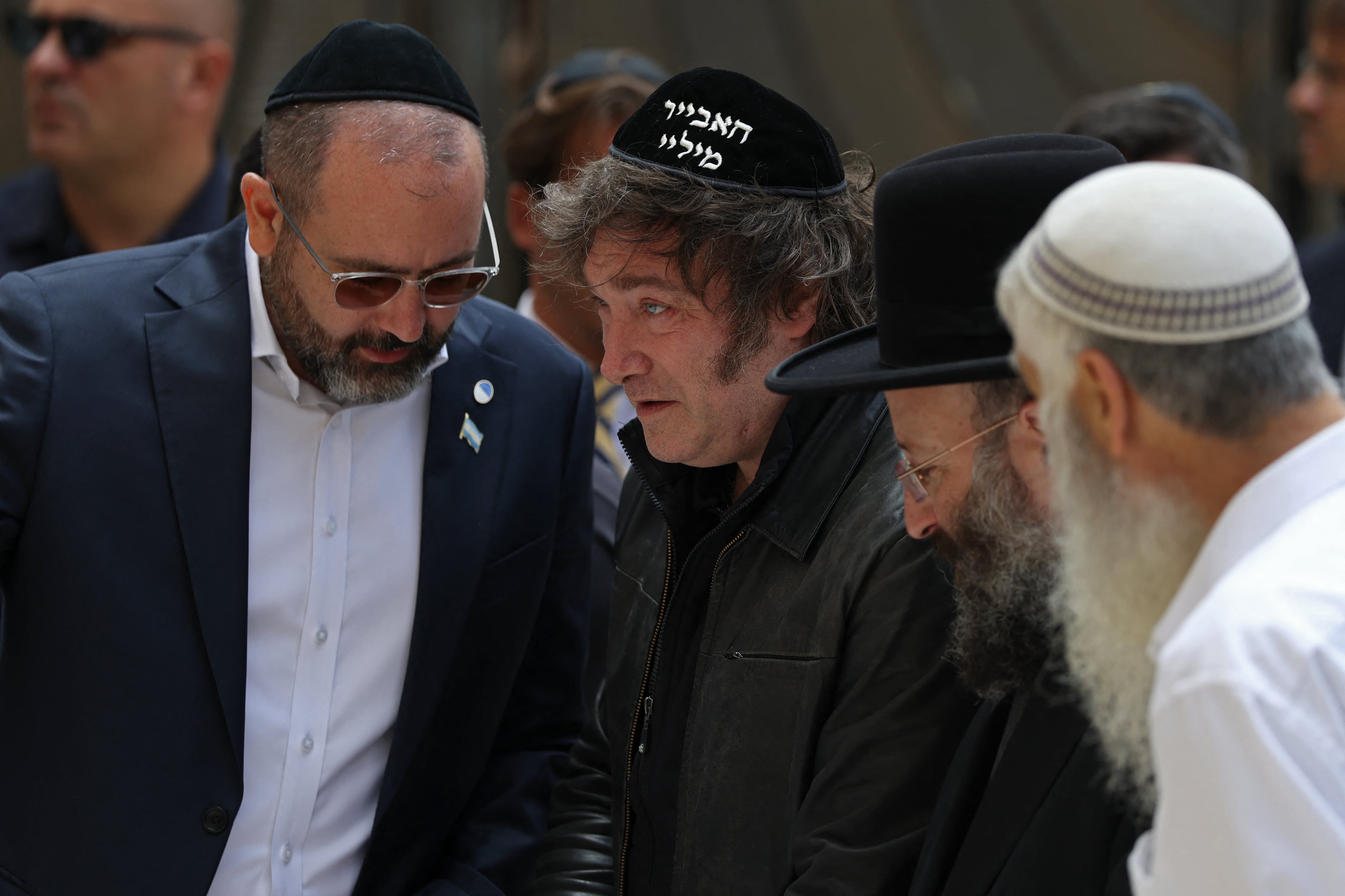 Argentina's President Javier Milei (C) visits the Western Wall in the old city of Jerusalem on April 19, 2026. (Photo by Ilia YEFIMOVICH / AFP)
